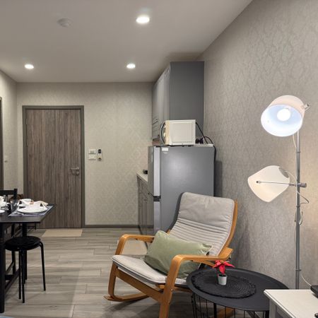 Living room in apartment C406, photo 1
